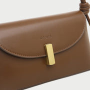 Metal clasp flap knotted strap PU leather shoulder bag