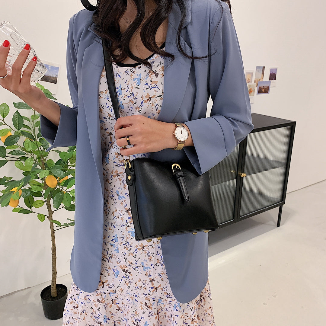 Modern strap style PU leather bucket bag
