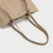 Rope charm studded PU leather tote bag
