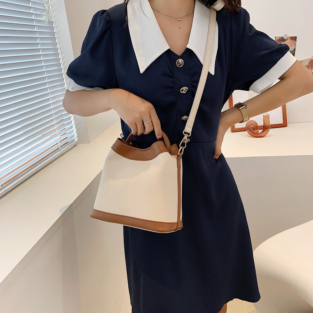 現代簡約風格手柄大容量仿皮水桶包