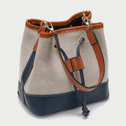 Modern drawstring detail colourblock PU leather canvas bucket bag