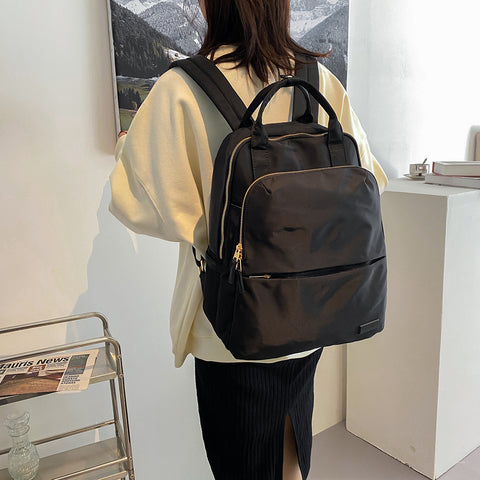 Top handle zip compartment minimalistic unisex nylon backpack