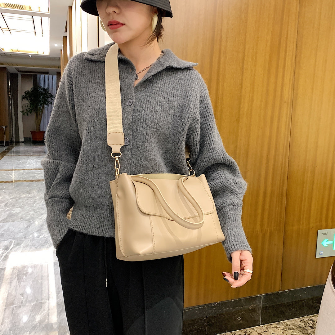 Minimalistic open-top flap style PU leather tote bag