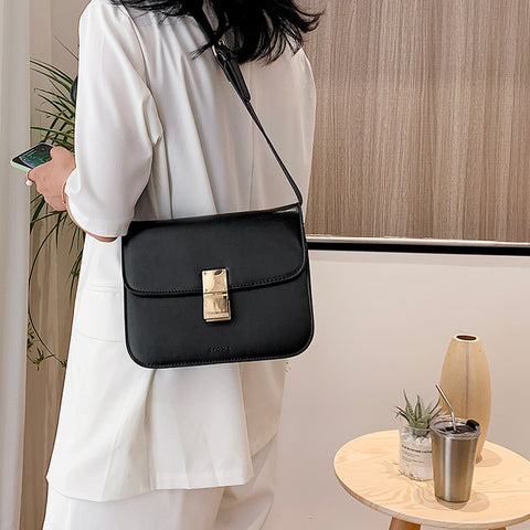 Metal clasp flap front PU leather crossbody bag