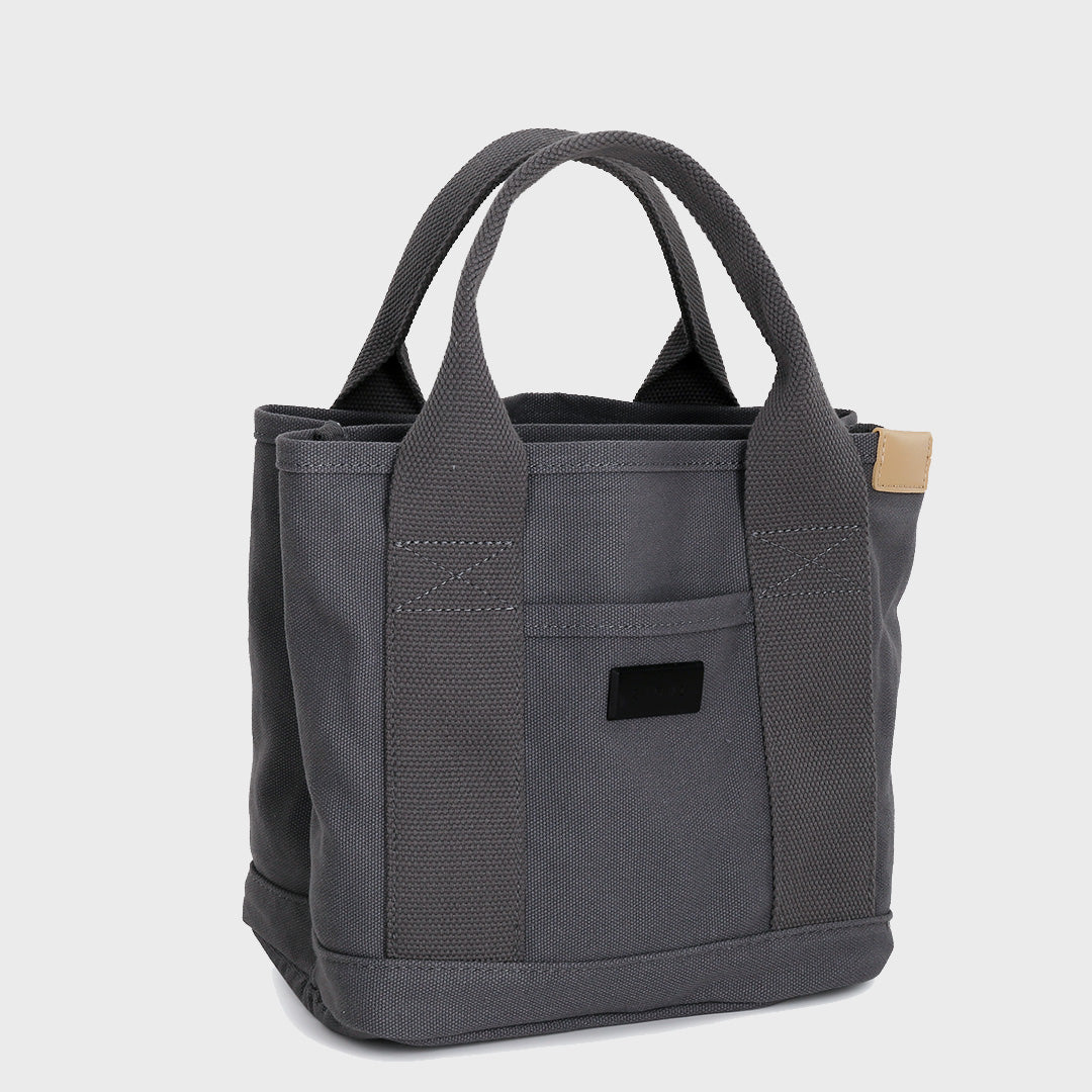 Structural interior multiple compartment canvas handbag
