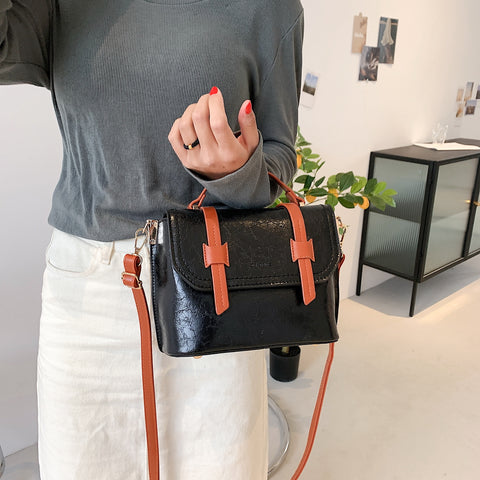 Retro contrast strapped flapover style unisex marble-effect PU leather bag