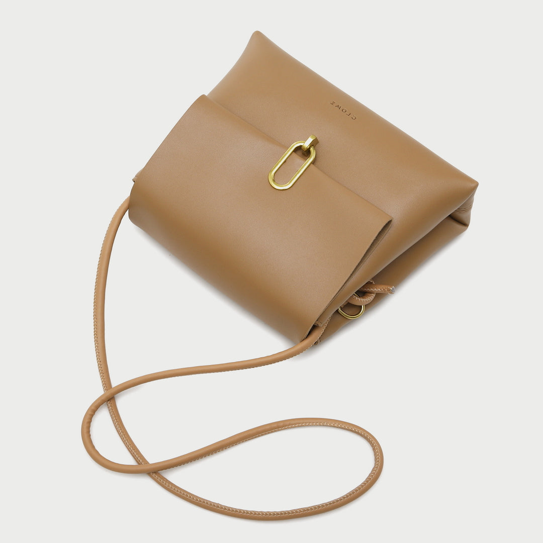 Oval hoop metallic closure dual compartment PU leather bag