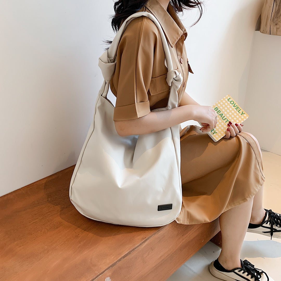 Knotted strap roomy canvas hobo bag