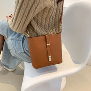 Metal accent strap PU leather crossbody bag