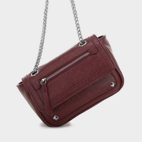 Zipped front flap studded PU leather crossbody bag