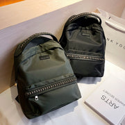 Woven chain strap embellished nylon backpack
