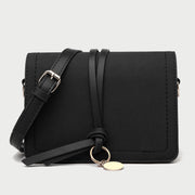 Knotted strap metal disc embellished PU leather crossbody bag