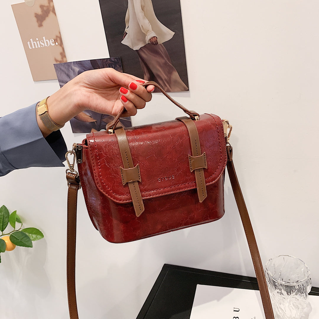 Retro contrast strapped flapover style unisex marble-effect PU leather bag