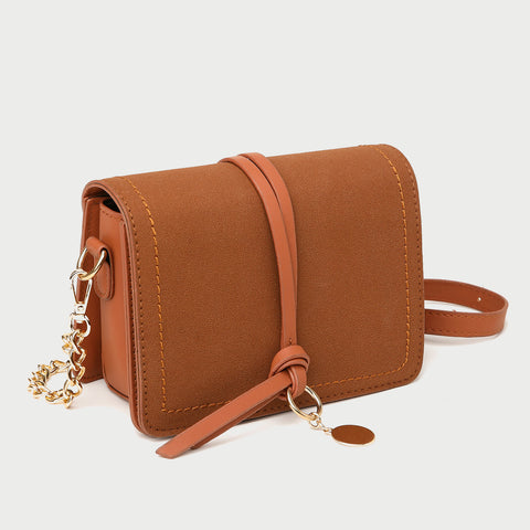 Knotted strap metal disc embellished PU leather crossbody bag