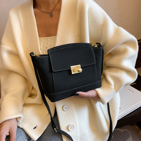 Modern metal-closure flap sculptural faux suede crossbody bag