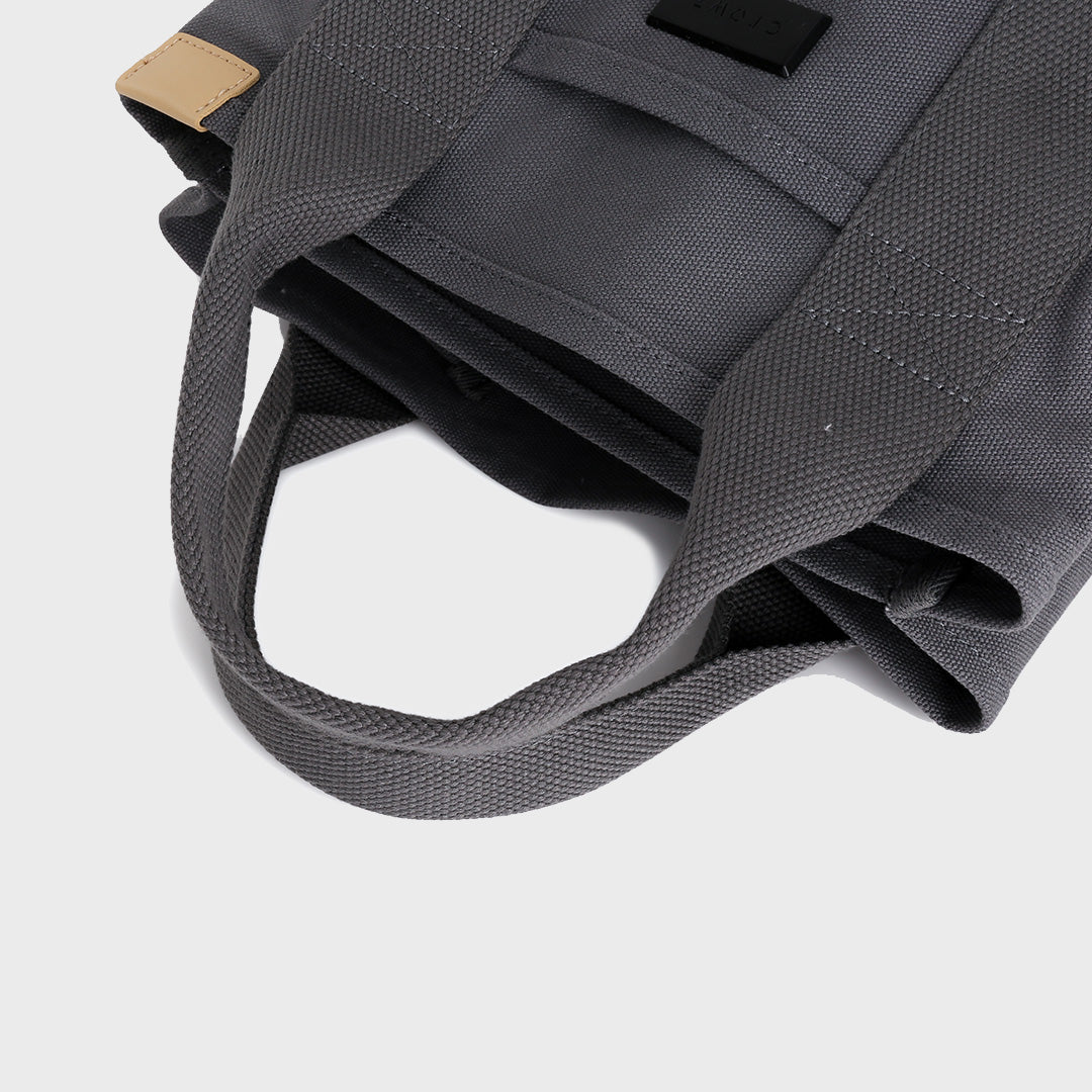 Structural interior multiple compartment canvas handbag