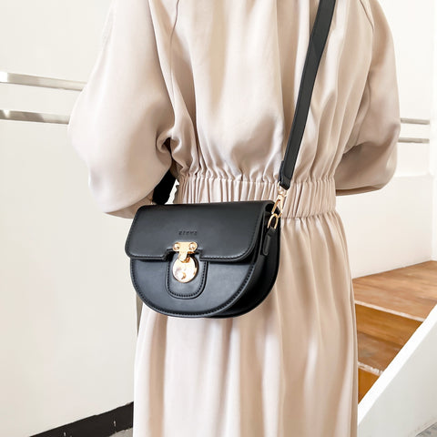 Elegant metal closure PU leather saddle crossbody bag
