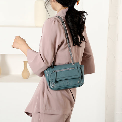 Zipped front flap studded PU leather crossbody bag