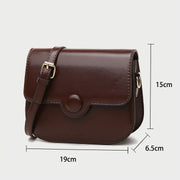 Button detail streamlined flapover PU leather crossbody bag