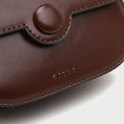 Button detail streamlined flapover PU leather crossbody bag