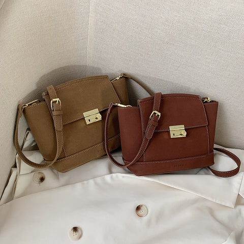 Modern metal-closure flap sculptural faux suede crossbody bag
