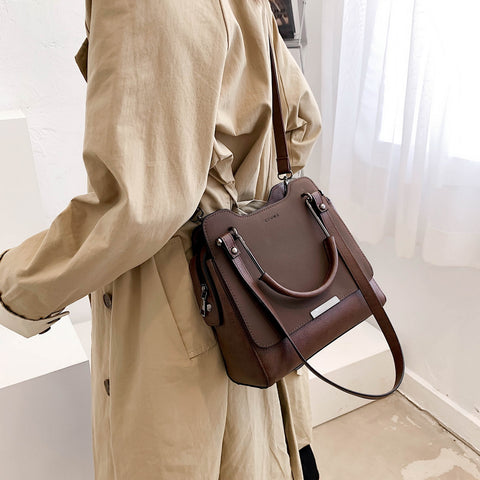 Front flap metal handle multi-strap zipped PU leather crossbody bag
