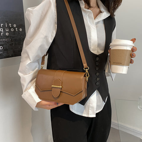 Retro saddle-inspired strap detail flap PU leather crossbody bag