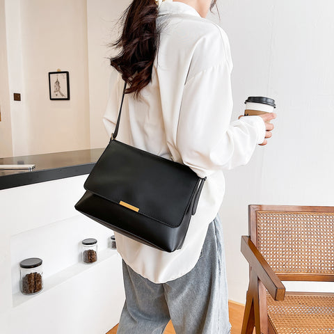 Metal hardware flap style PU leather crossbody bag