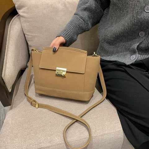 Modern metal-closure flap sculptural faux suede crossbody bag