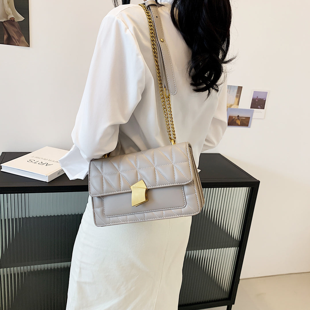 Modern abstract metal closure quilted PU leather crossbody bag