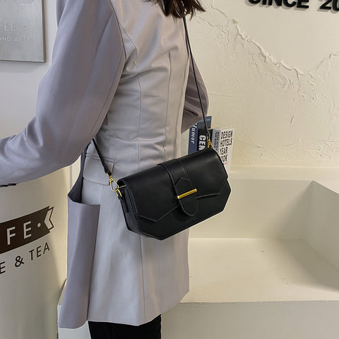Retro saddle-inspired strap detail flap PU leather crossbody bag