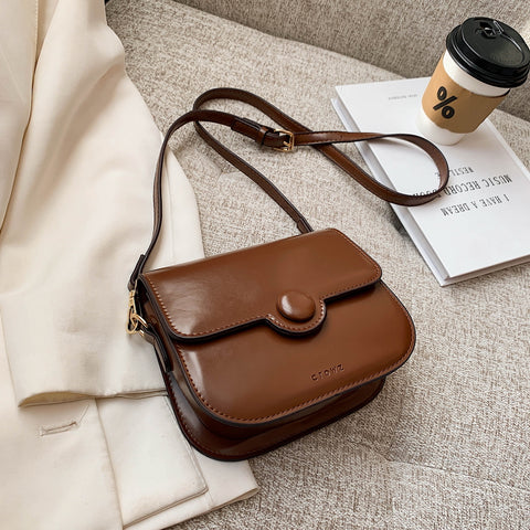 Button detail streamlined flapover PU leather crossbody bag