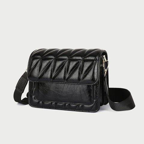 Flap style dual compartment quilted PU leather crossbody bag