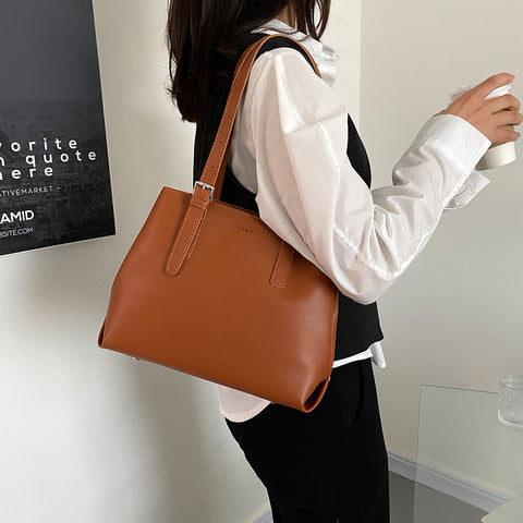 Minimalistic buckle detail strap PU leather tote bag