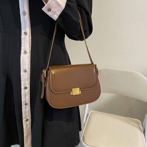 Metal square press lock minimalist saddle style PU leather shoulder bag
