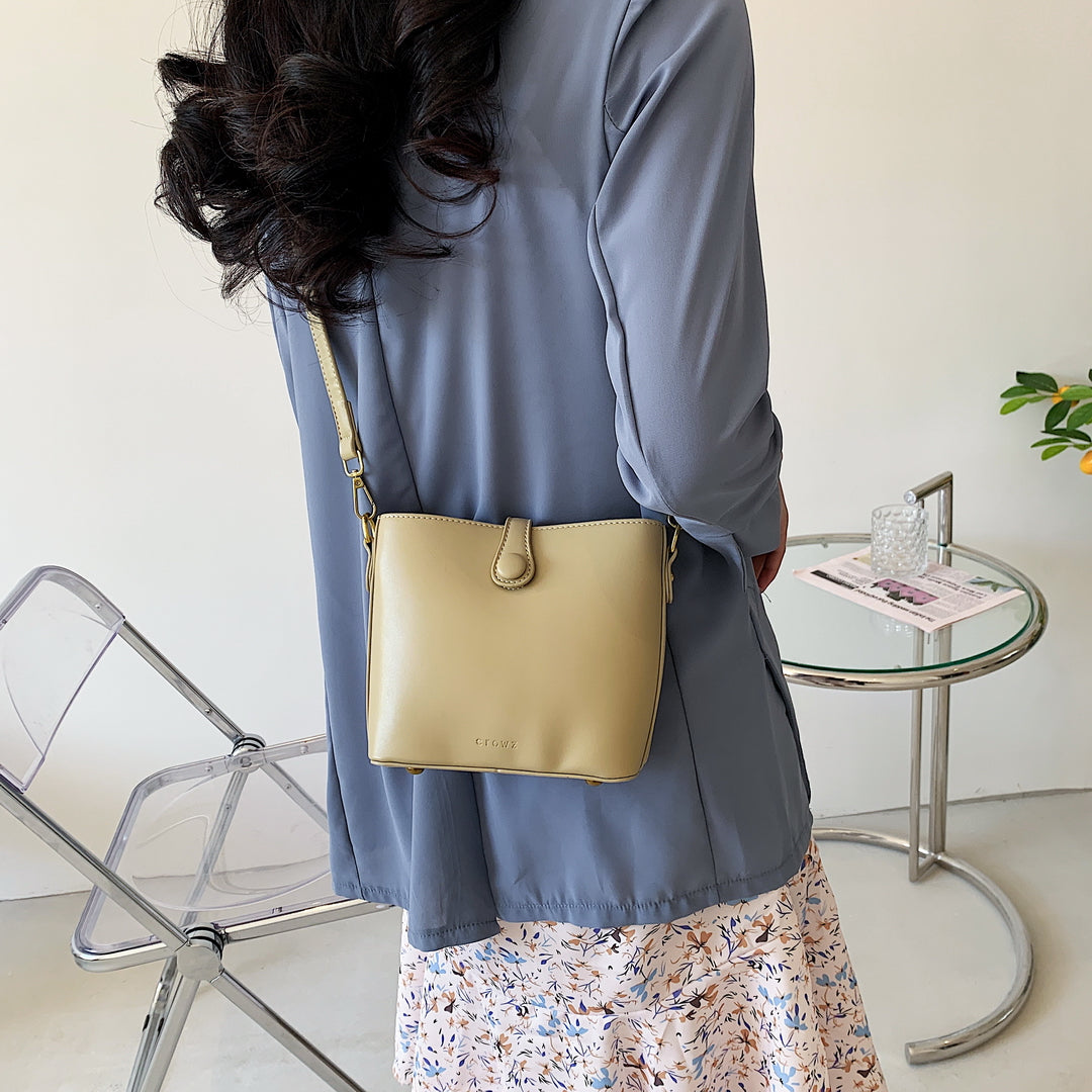 Modern strap style PU leather bucket bag
