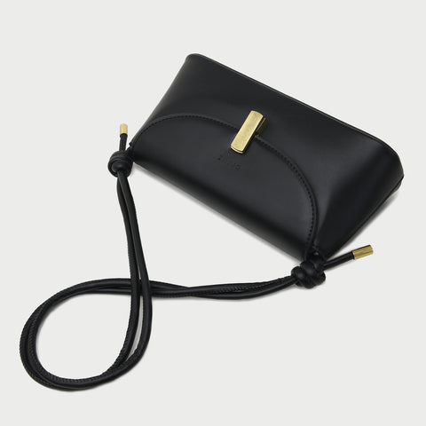 Metal clasp flap knotted strap PU leather shoulder bag