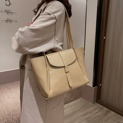 Classic strapped flap style PU leather tote bag