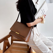 Metal hardware flap style PU leather crossbody bag