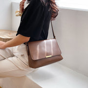 Metal hardware flap style PU leather crossbody bag