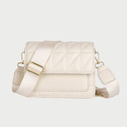 Flap style dual compartment quilted PU leather crossbody bag