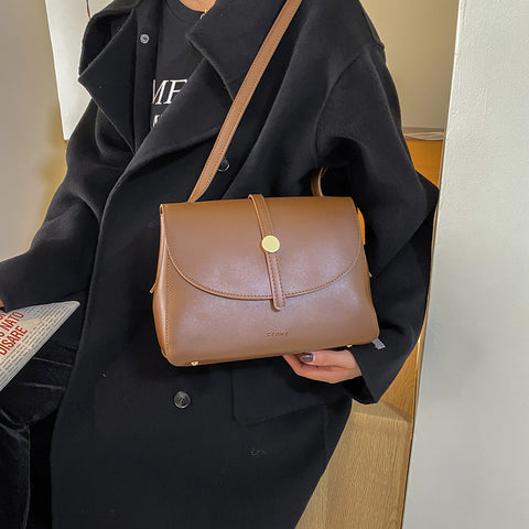 Metal stud strap flap PU leather crossbody bag