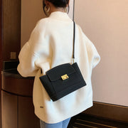 Modern metal-closure flap sculptural faux suede crossbody bag