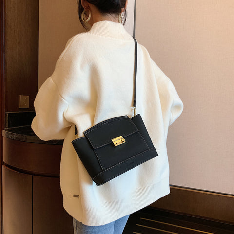 Modern metal-closure flap sculptural faux suede crossbody bag