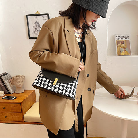 Metal clasp flap knotted strap PU leather shoulder bag