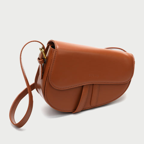 Retro strap detail flap sculptural PU leather saddle bag