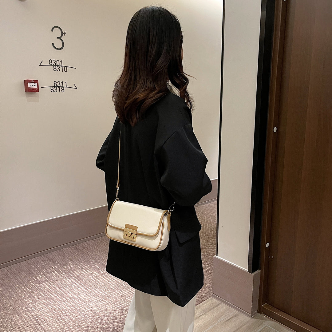 優雅編織帶細節金屬夾扣翻蓋設計仿皮斜背包