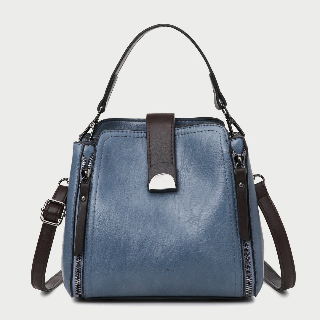 Half moon metal embellished strap zip side PU leather bucket bag