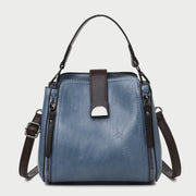 Half moon metal embellished strap zip side PU leather bucket bag
