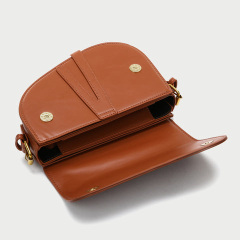 Retro strap detail flap sculptural PU leather saddle bag